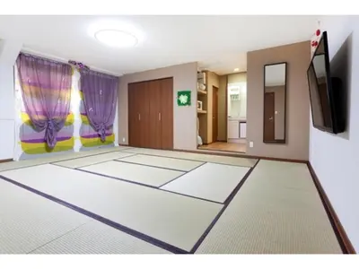an empty room with a flat screen tv on the wall at Hotel Hanabi - Vacation STAY 67149v in Tokyo