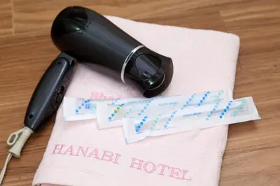 a pen sitting on top of a towel with a table at Hotel Hanabi - Vacation STAY 89136v in Tokyo