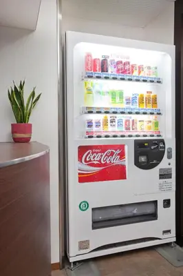 an open cocacola refrigerator with drinks in it at Hotel Hanabi - Vacation STAY 89124v in Tokyo