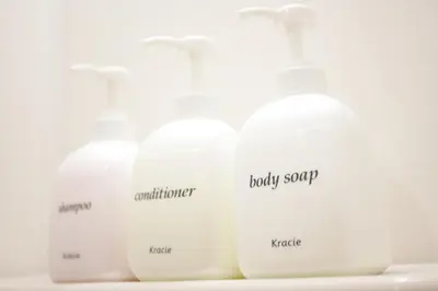 a group of white bottles of laundry soap at Hotel Hanabi - Vacation STAY 89124v in Tokyo