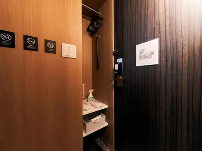 a door to a bathroom with aiger at Rakuten STAY Tokyo Asakusa in Tokyo