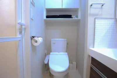 a small bathroom with a toilet and a sink at Shinjuku Ryokan Retreat丶Local Tokyo Experience & Short Trips Hub丶walk to Higahsi Shinjuku station YEoL in Tokyo