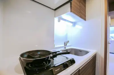 a frying pan on top of a stove in a kitchen at Shinjuku Ryokan Retreat丶Local Tokyo Experience & Short Trips Hub丶walk to Higahsi Shinjuku station YEoL in Tokyo