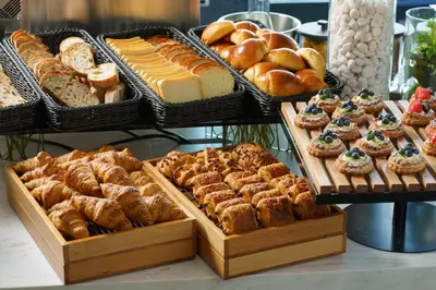 a display of different types of bread and pastries at Premier hotel -CABIN PRESIDENT- Tokyo in Tokyo