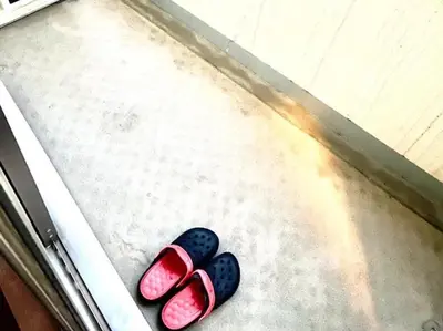 two pairs of flip flops sitting on the floor at Regalia Hills Shibuya Dogenzaka - Vacation STAY 15550 in Tokyo