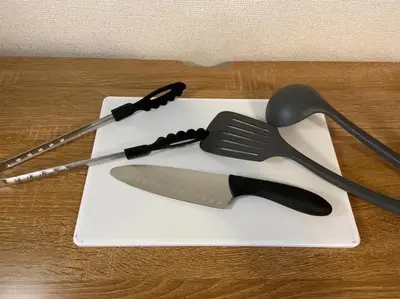 a group of utensils sitting on a white plate at Regalia Hills Shibuya Dogenzaka - Vacation STAY 15550 in Tokyo