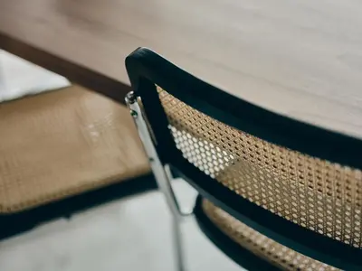 a close up of a chair at a table at illi Com Shimokitazawa in Tokyo