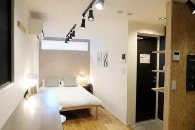 a bedroom with a bed and a large window at \u5922\u306e\u820e Asakusa Horizon Bleu in Tokyo