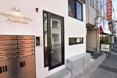 a building with a door on the side of a street at \u5922\u306e\u820e Asakusa Horizon Bleu in Tokyo