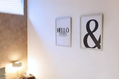two framed pictures on a white wall in a room at \u5922\u306e\u820e Asakusa Horizon Bleu in Tokyo