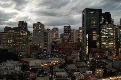a city skyline with a lot of tall buildings at Shinjuku City House \u65b0\u5bbf\u30b7\u30c6\u30a3\u30cf\u30a6\u30b9 in Tokyo