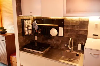 a kitchen with a sink and a counter top at TokyoKoso Vacation Home in Tokyo