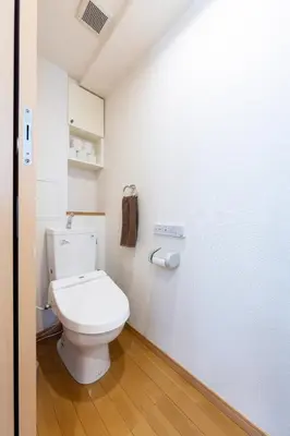 a bathroom with a white toilet in a room at ROMANTIC FLAT IN THE HEART OF SHIBUYA / 7MIN WALK in Tokyo