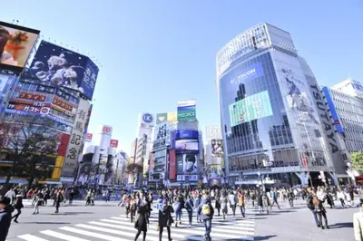 a crowd of people crossing a street in a city at ROMANTIC FLAT IN THE HEART OF SHIBUYA / 7MIN WALK in Tokyo