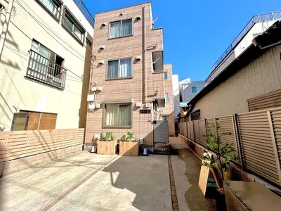 an alleyway in front of a building at \u5922\u306e\u820e \u6d45\u8349 Yumenoya Asakusa in Tokyo