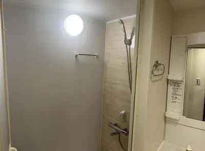 a bathroom with a shower and a toilet at Shinjuku private homestay max 10ppl in Tokyo