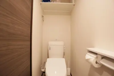 a bathroom with a white toilet in a room at Shinjuku private homestay max 10ppl in Tokyo