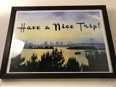 a picture of a river with the words have a nice trip at Shinagawa New Apt Easy access to both Haneda & Narita Airport in Tokyo