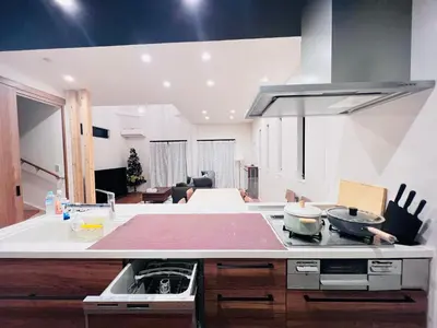 a kitchen with a counter top with a stove top at Zaki-House-EG0307 in Tokyo