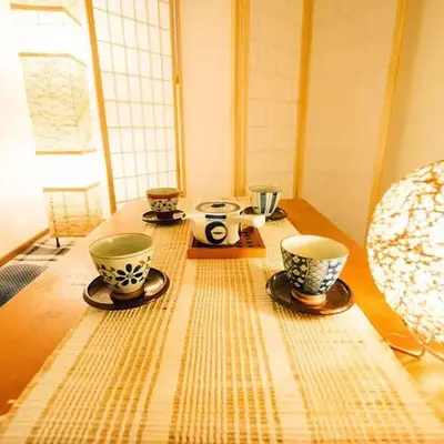 a wooden table with three cups on top of it at \u76f4\u8fbe-\u6c60\u888b-2\u5206\u949f \u8f66\u7ad9\u5f92\u6b656\u5206\u949f 3bedrooms-IT0338 in Tokyo