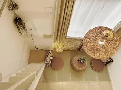 a living room with stairs and a window at Koenji loft apartment/Shinjuku&Kichijoji/JR in Tokyo