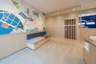 a childrens play room with a map on the wall at Hop Inn Tokyo Iidabashi in Tokyo