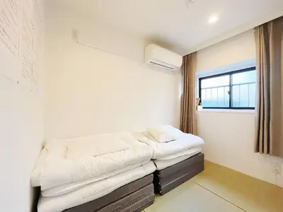 a room with a bed in it with a window at Hananosato Akabane - Vacation STAY 06096v in Tokyo