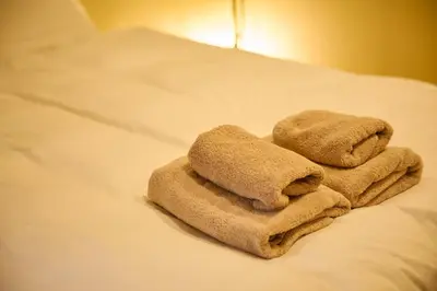 two towels sitting on top of a bed at futaba heights - Vacation STAY 15532 in Tokyo
