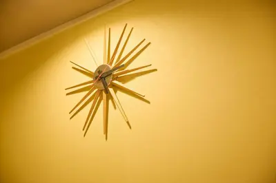a clock hanging on a yellow wall at futaba heights - Vacation STAY 15532 in Tokyo