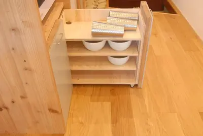 a book shelf with bowls and books on it at futaba heights - Vacation STAY 15415 in Tokyo
