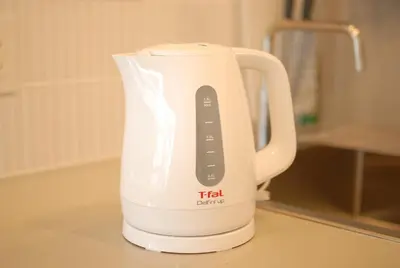 a white electric kettle sitting on a counter at futaba heights - Vacation STAY 15415 in Tokyo