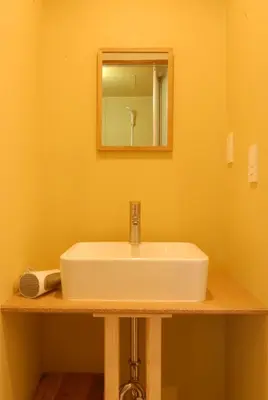 a white sink in a bathroom with a mirror at futaba heights - Vacation STAY 15415 in Tokyo