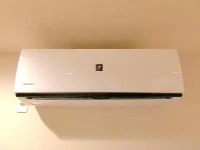 a laptop computer is hanging on a wall at futaba heights - Vacation STAY 15533 in Tokyo
