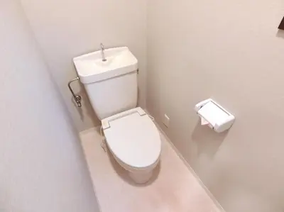 a white toilet in a bathroom with a roll of toilet paper at futaba heights - Vacation STAY 15533 in Tokyo