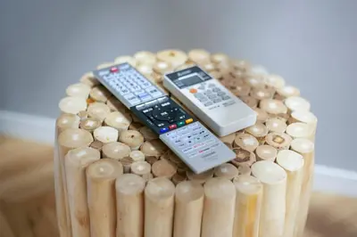 a group of remote controls on top of a pile of matches at \u30ea\u30a2\u30eb\u9326\u7cf8101 in Tokyo