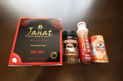 a box of jam grey and a bottle of jam grey and a drink at “1ST ROOM” 内装デザイナー監修！30㎡ 最大6名 経堂駅から徒歩5分 築浅 良質な暮らしを in Tokyo