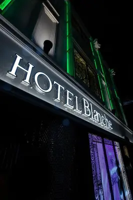 a sign for a hilton blazer on a building at Hotel Blanche \u5927\u4eba\u5c02\u7528 Adult only hotel in Tokyo