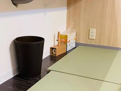 a kitchen with a trash can and a box on a counter at Sky house\u6674\u7a7a\u58543 in Tokyo