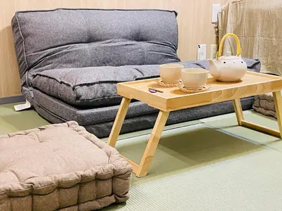 a living room with a coffee table and a couch at Sky house\u6674\u7a7a\u58543 in Tokyo