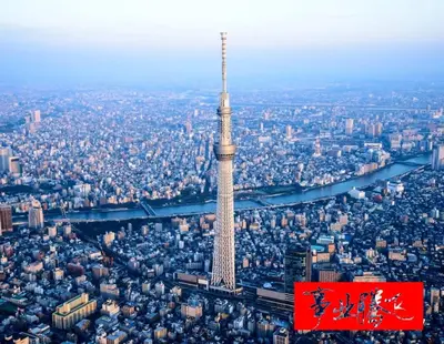 an aerial view of the osaka tower with a sign at Sky house \u6674\u7a7a\u585413 in Tokyo