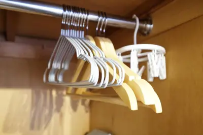 a bunch of kitchen utensils hanging from a rack at \u5922\u306e\u820e \u65b0\u5bbf Yumenoya Shinjuku in Tokyo