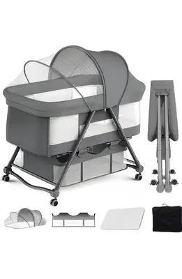 an empty baby crib with a chair next to it at PALAIS GRACE 301 in Tokyo