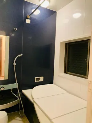 a bathroom with a shower with a toilet and a window at Kamei House - Vacation STAY 07100v in Tokyo