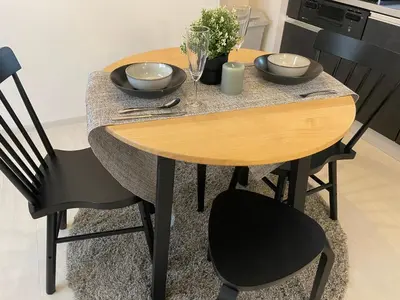 a wooden table with two bowls on top of it at Oak Stay Shimokitazawa Luxury Family size 2min Shimokitazawa sta Shinjuku Shibuya7min by train in Tokyo