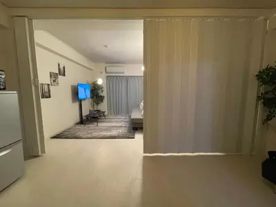 an open hallway with a living room with a couch at Oak Stay Shimokitazawa Luxury Family size 2min Shimokitazawa sta Shinjuku Shibuya7min by train in Tokyo