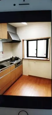 an empty kitchen with a stove and a window at \u6c60\u888b\u5feb\u901f\u4e00\u99c5kyoka house in Tokyo
