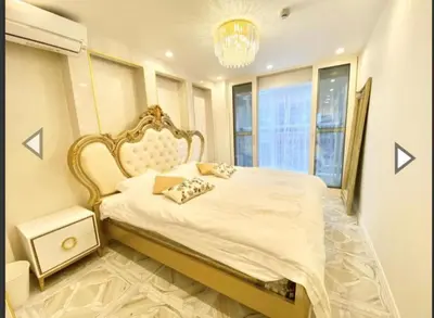 a bedroom with a large bed and a window at Reimi Mondo201 in Tokyo