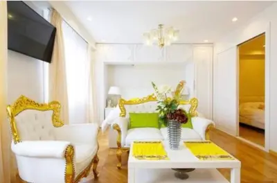 a living room with a white couch and a table at Reimi Mondo401-7897 in Tokyo