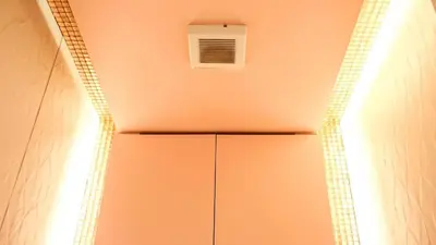 a hallway with a ceiling fan and a vent at Reimi Mondo601 in Tokyo