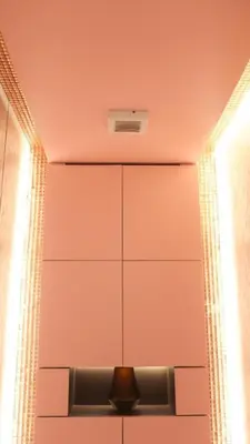 a room with pink walls and a ceiling at Reimi Mondo601 in Tokyo